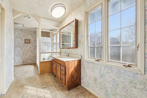 a bathroom with a sink and a bathtub