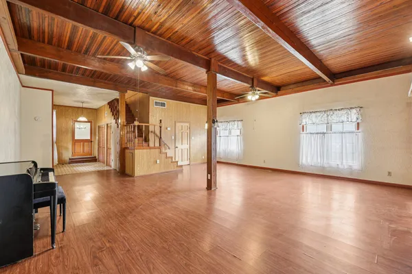 a view of a livingroom with wooden floor