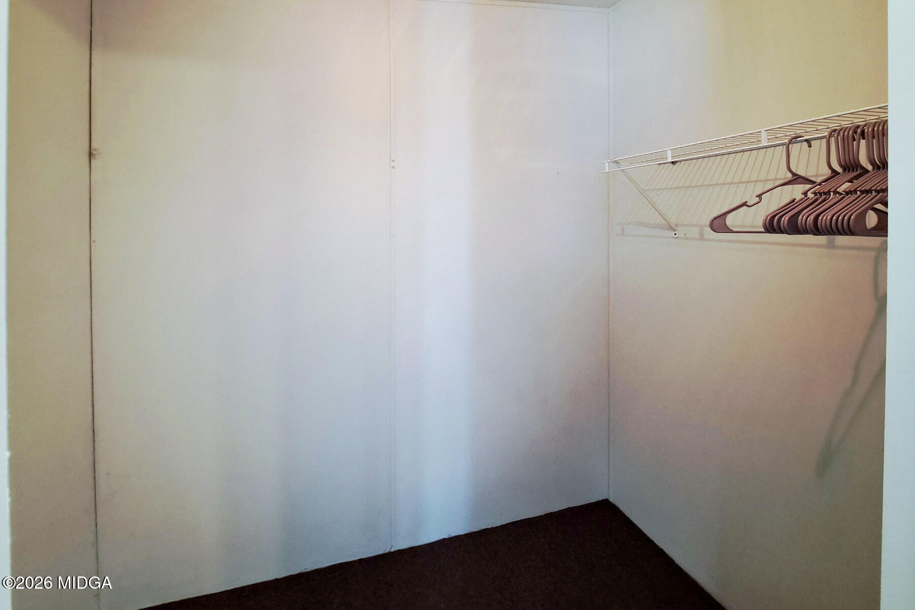 398 Jeffrey Way Forsyth, GA 31029 - Photo 22 of 34 a view of small space with racks on the wall