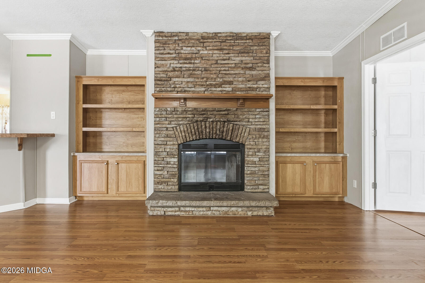 398 Jeffrey Way Forsyth, GA 31029 - Photo 8 of 34 a living room with a fireplace
