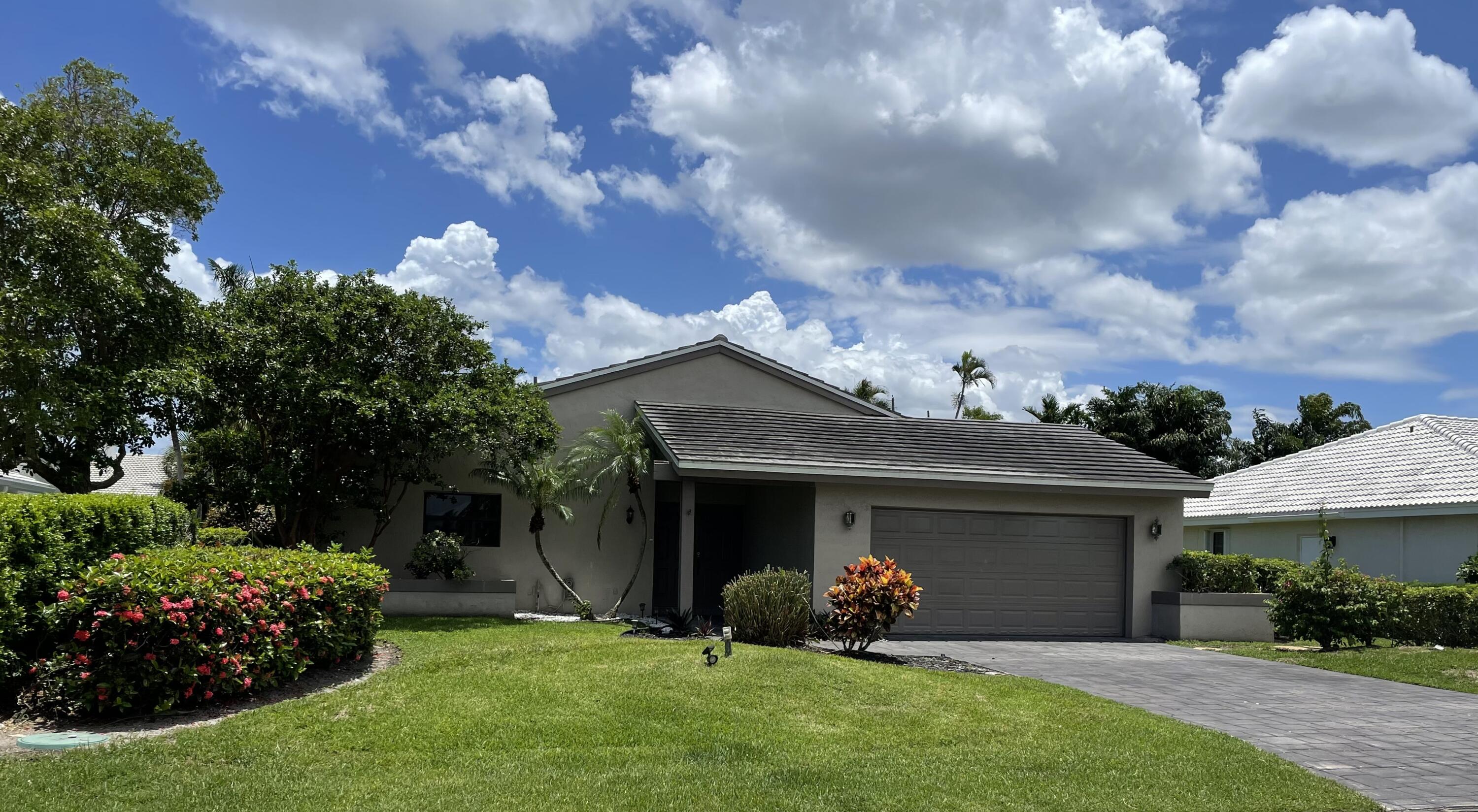 240 Northwest 70th Street Boca Raton, FL 33487 - Photo 1 of 46 7BD80F26-0EF3-4689-9EBF-8EE2ACDB8E5A_1_2