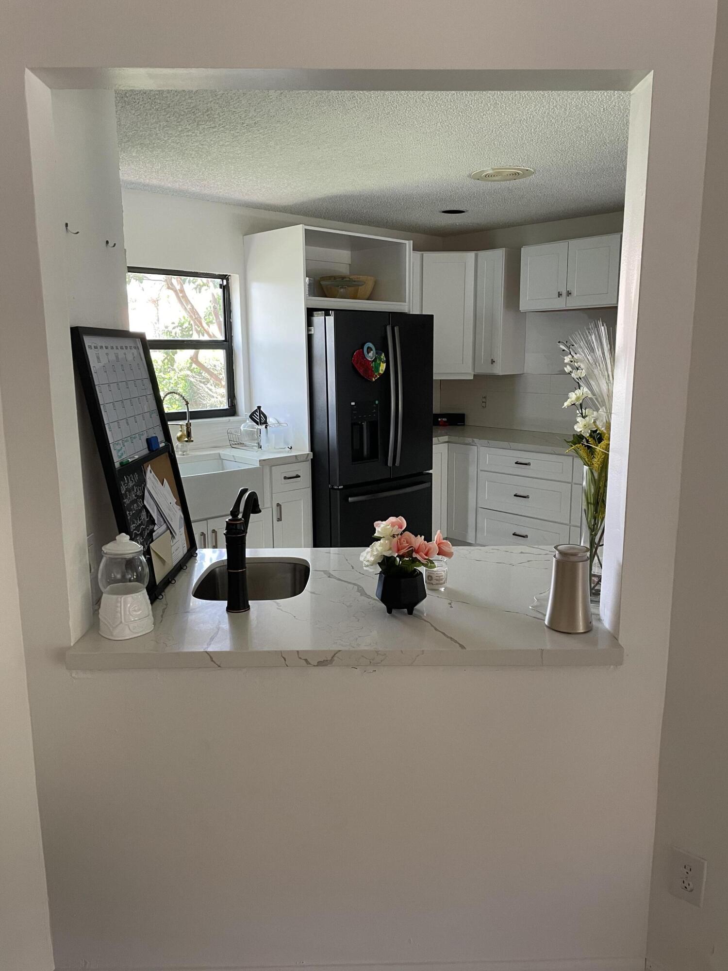 240 Northwest 70th Street Boca Raton, FL 33487 - Photo 5 of 46 E832F7A6-E47B-4B58-8FC5-947CD58A19E5