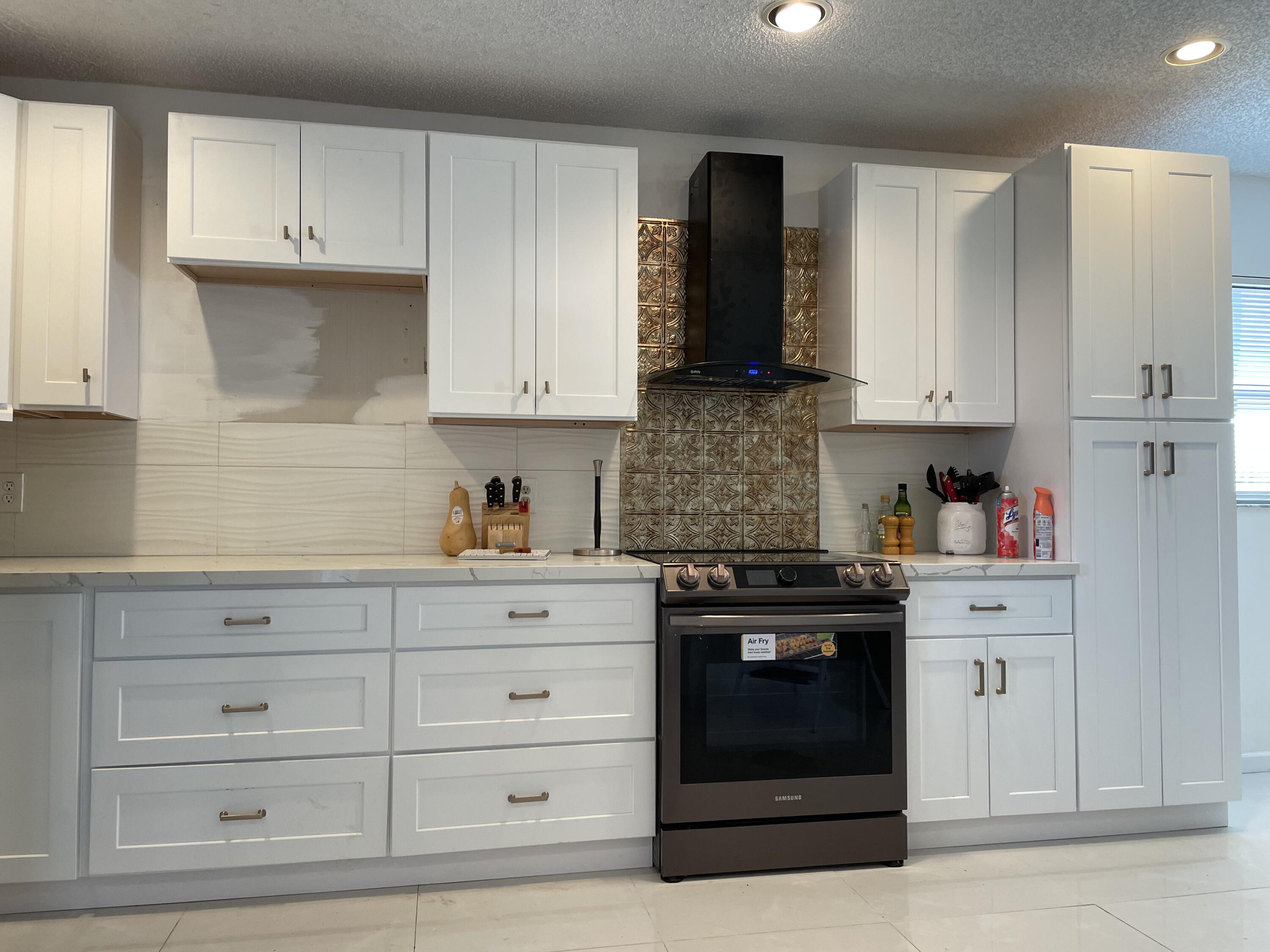 240 Northwest 70th Street Boca Raton, FL 33487 - Photo 8 of 46 3B0D9A6D-C9BD-478D-A3AB-9179C0638758