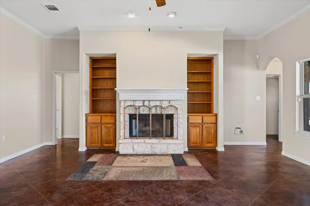 a view of interior space with wooden floor and windows
