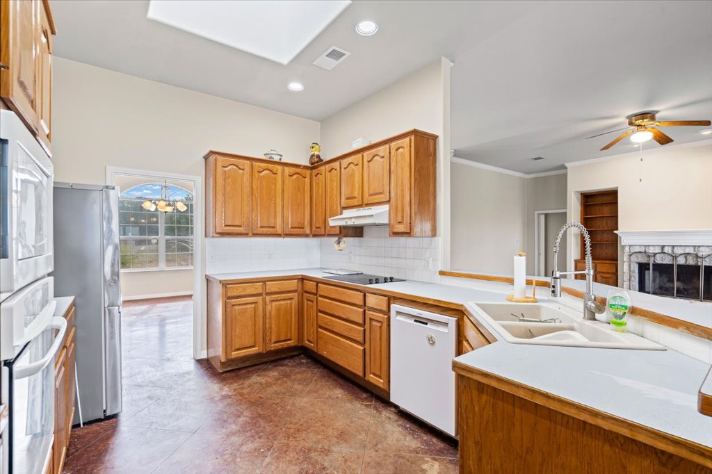 101 Valley Vista Road Wimberley, TX 78676 - Photo 13 of 23 The open layout ensures the cook is always part of the conversation.