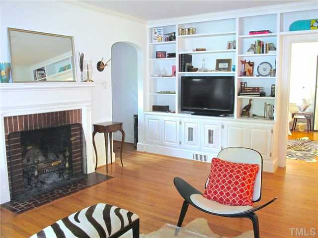 2113 Reaves Drive Raleigh, NC 27608 - Photo 5 of 18 a living room with furniture and a flat screen tv