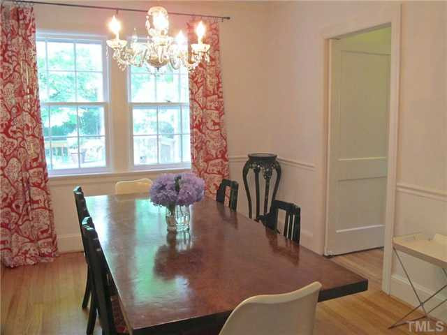 2113 Reaves Drive Raleigh, NC 27608 - Photo 7 of 18 a view of a dining room with furniture window and outside view