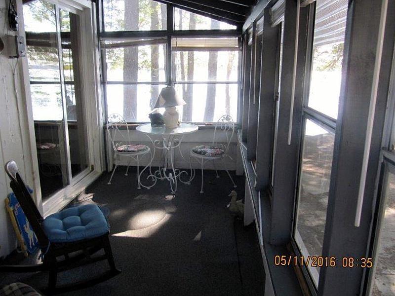 268 Pond Road Mercer, ME 04957 - Photo 20 of 32 Enclosed porch just off the living...