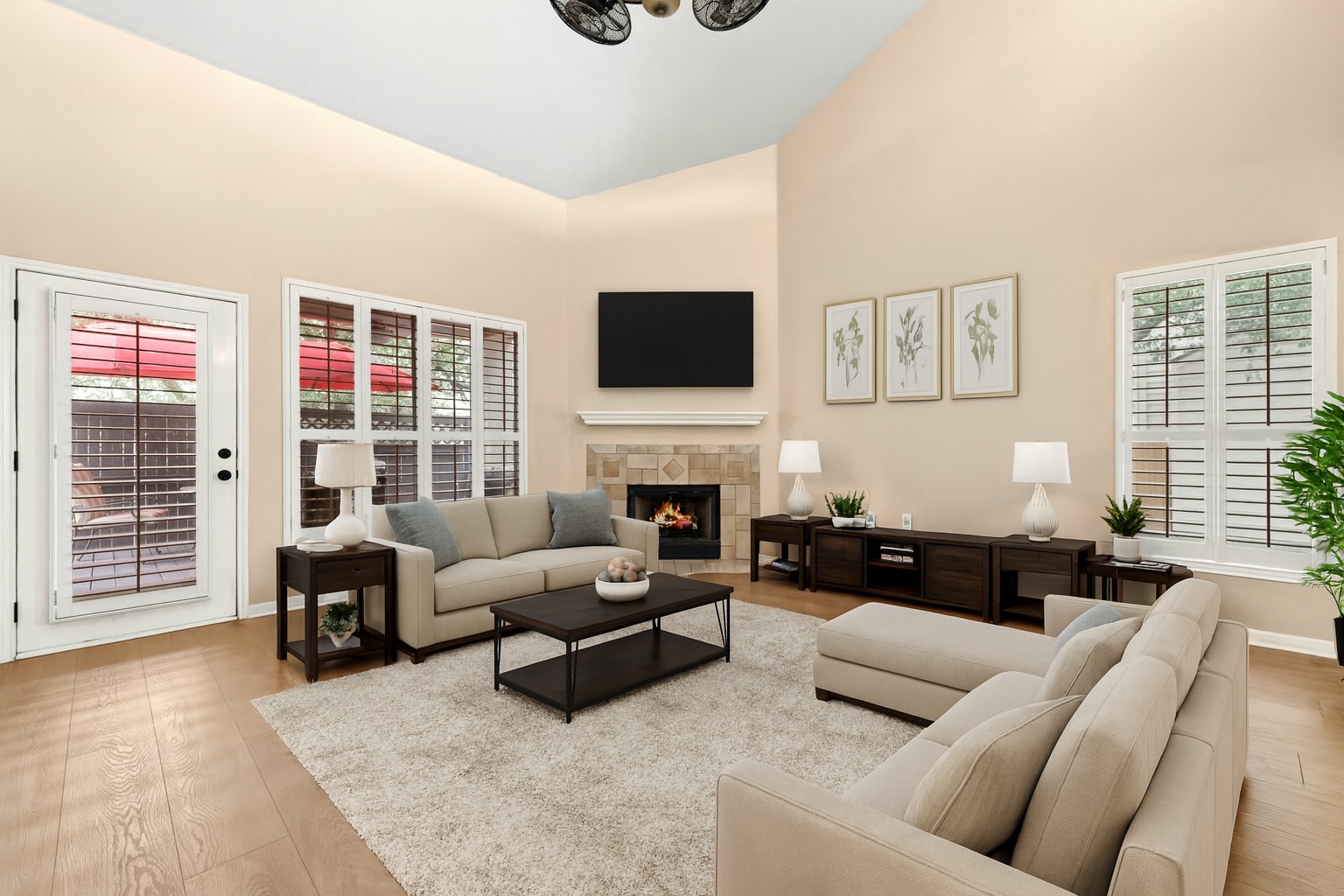 7500 Shadowridge Run, Unit 34 Austin, TX 78749 - Photo 8 of 27 a living room with furniture flat screen tv and a fireplace