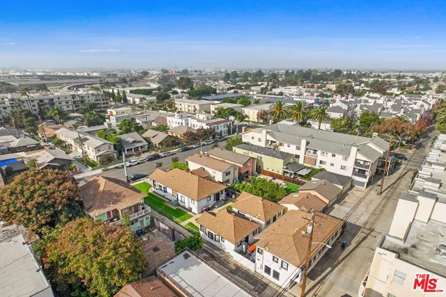 an aerial view of a city with lots of residential buildings