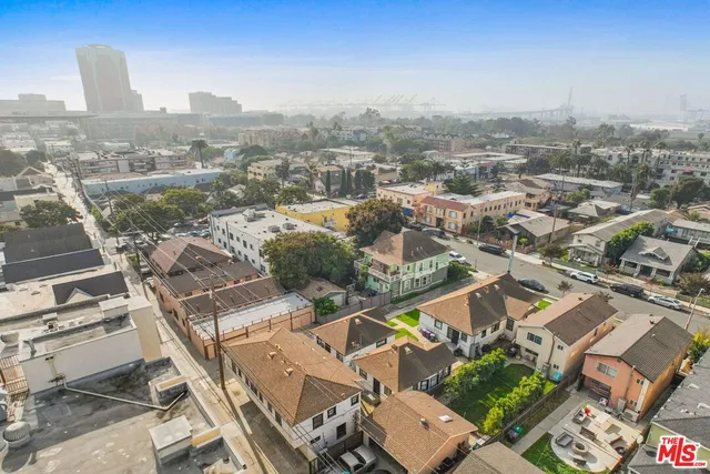 an aerial view of a city with lots of residential buildings