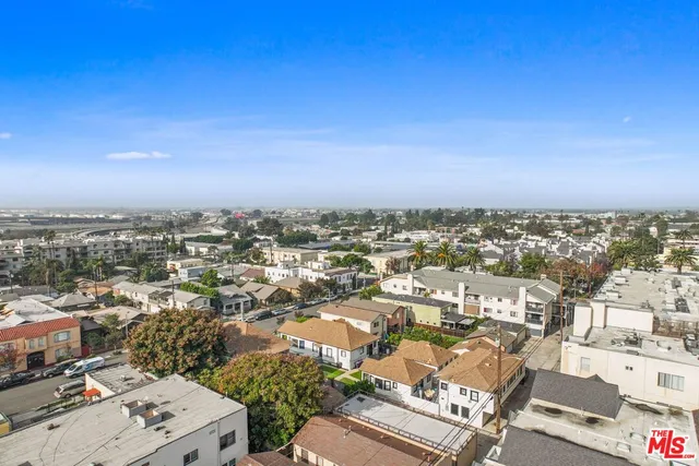 an aerial view of a city with lots of residential buildings