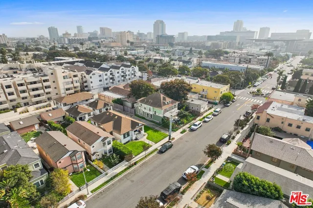 an aerial view of a city with lots of residential buildings