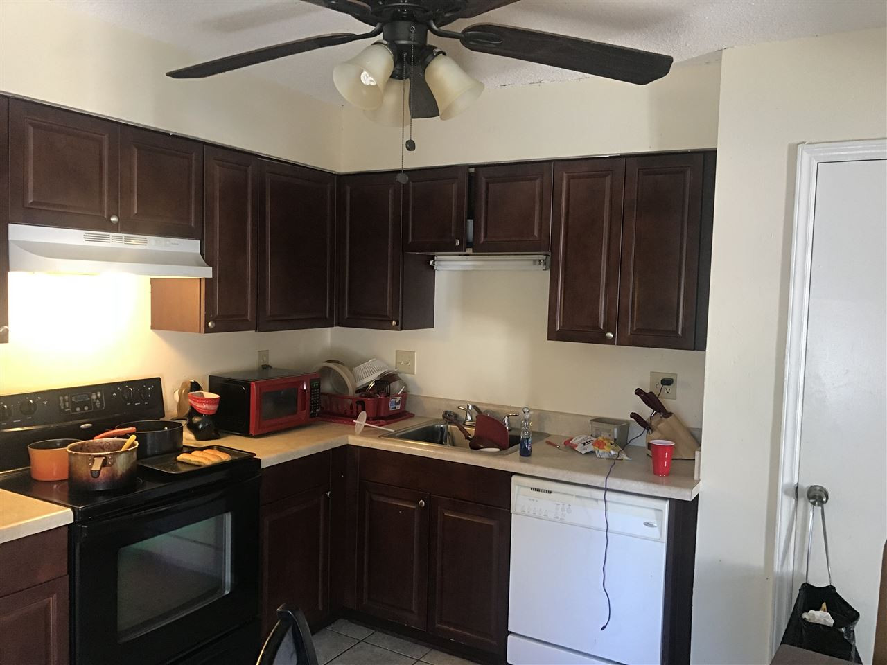 322 Junction Road, Unit 42C Durham, NC 27703 - Photo 3 of 4 a kitchen with a sink cabinets and window