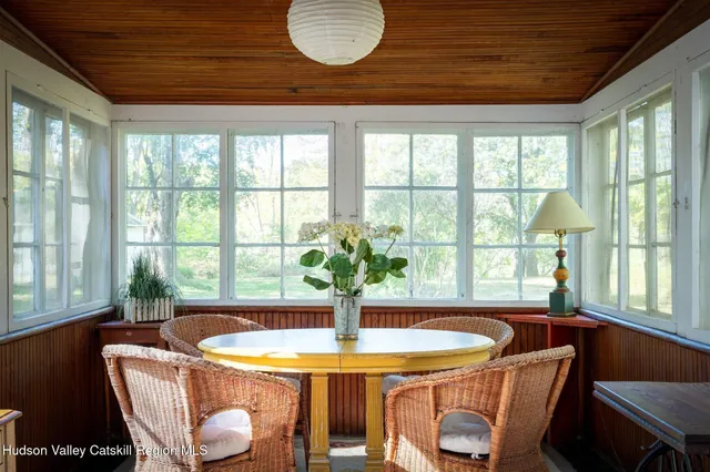 a bed room with a bed and a window