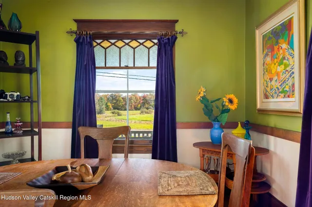 a kitchen with a stove and a table