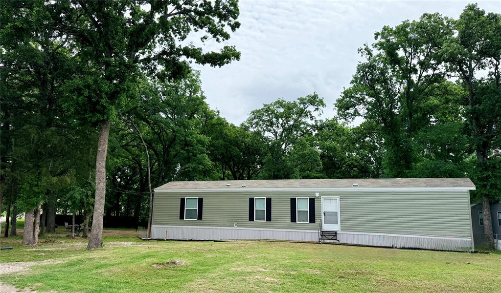 3193 Timberwild Street Wills Point, TX 75169 - Photo 1 of 13 a view of a house with a backyard