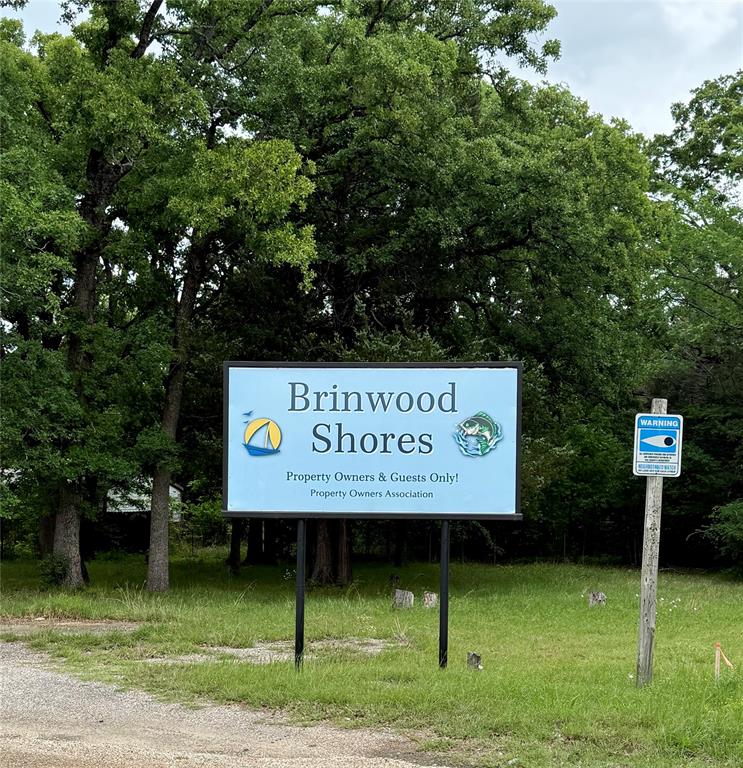 3193 Timberwild Street Wills Point, TX 75169 - Photo 13 of 13 a sign on the side of the road
