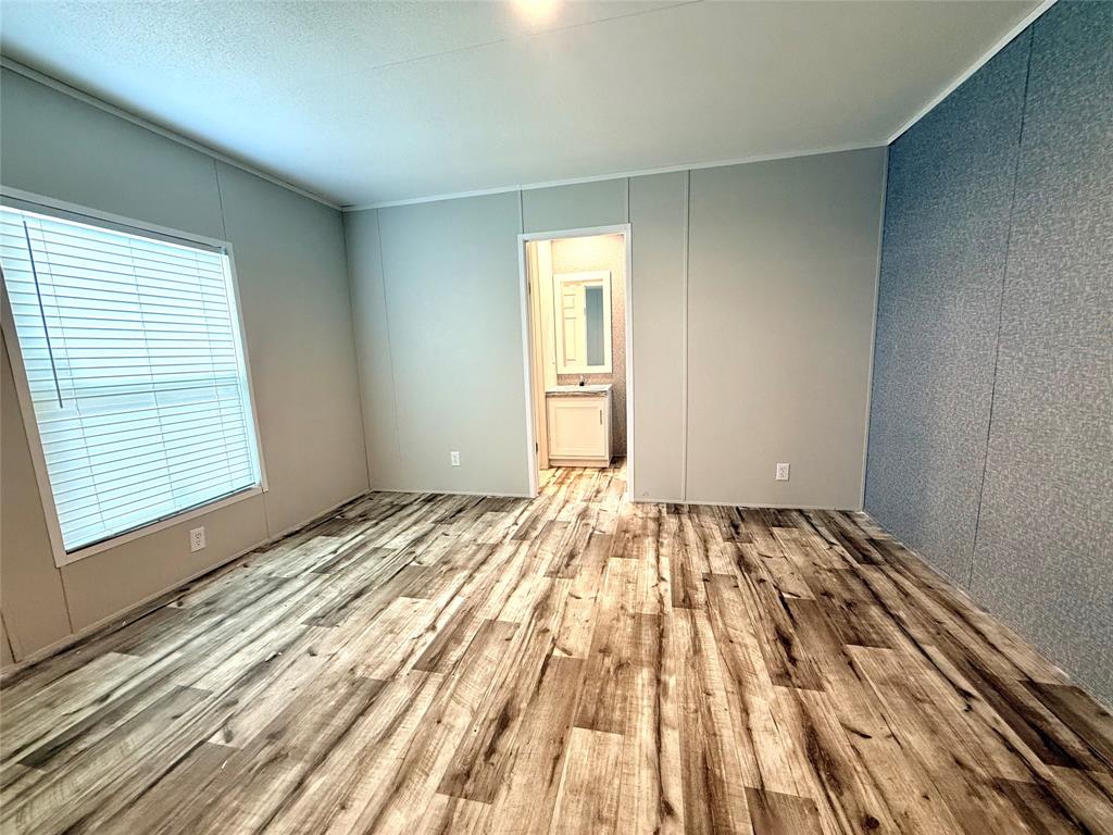 3193 Timberwild Street Wills Point, TX 75169 - Photo 6 of 13 a view of empty room with wooden floor
