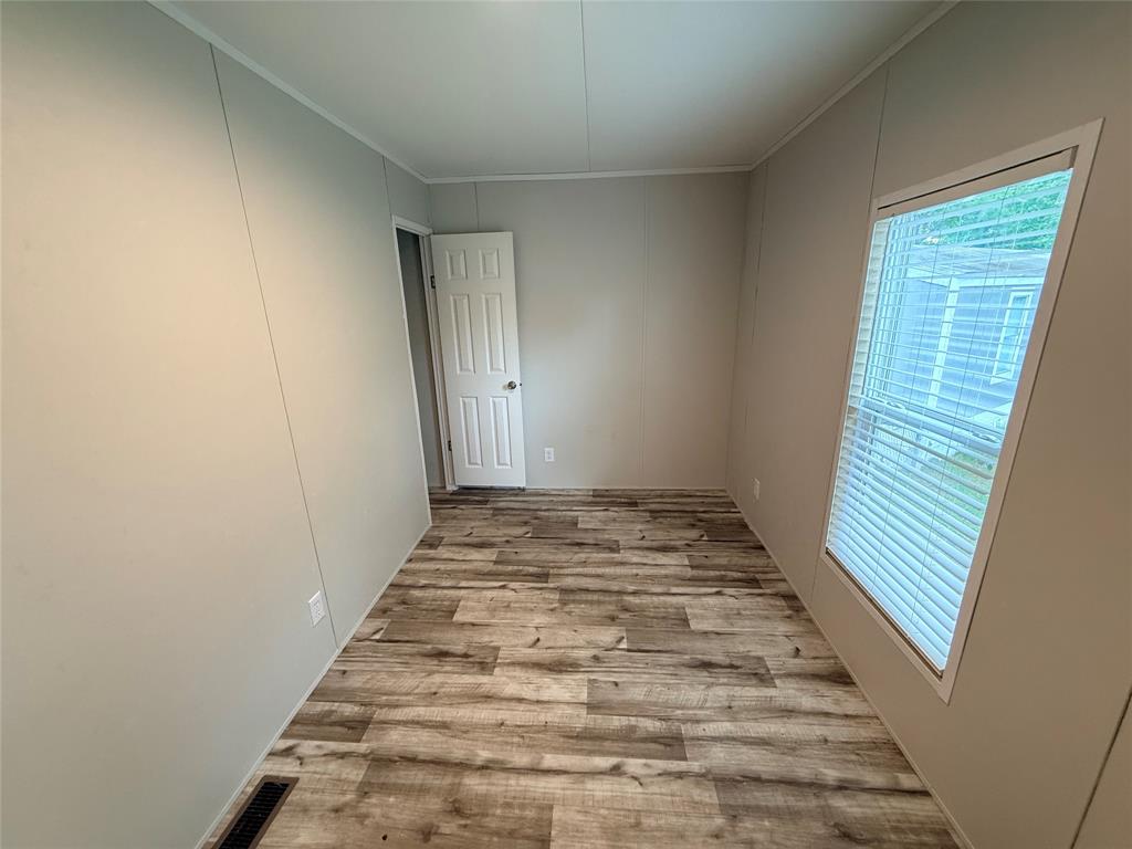 3193 Timberwild Street Wills Point, TX 75169 - Photo 9 of 13 a view of empty room with wooden floor