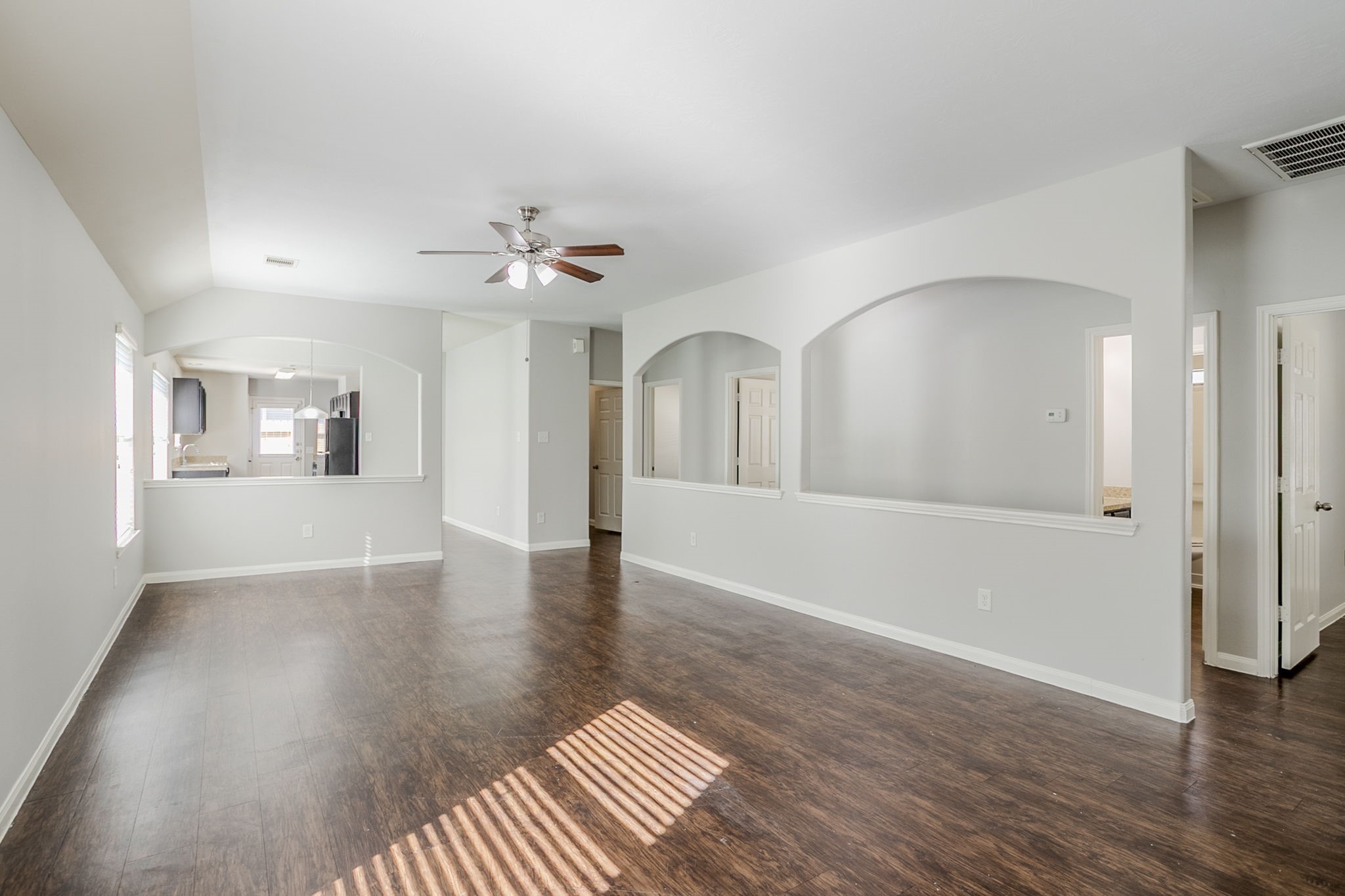 21431 Ryans Path Lane Houston, TX 77073 - Photo 12 of 38 wooden floor in an empty room with a window