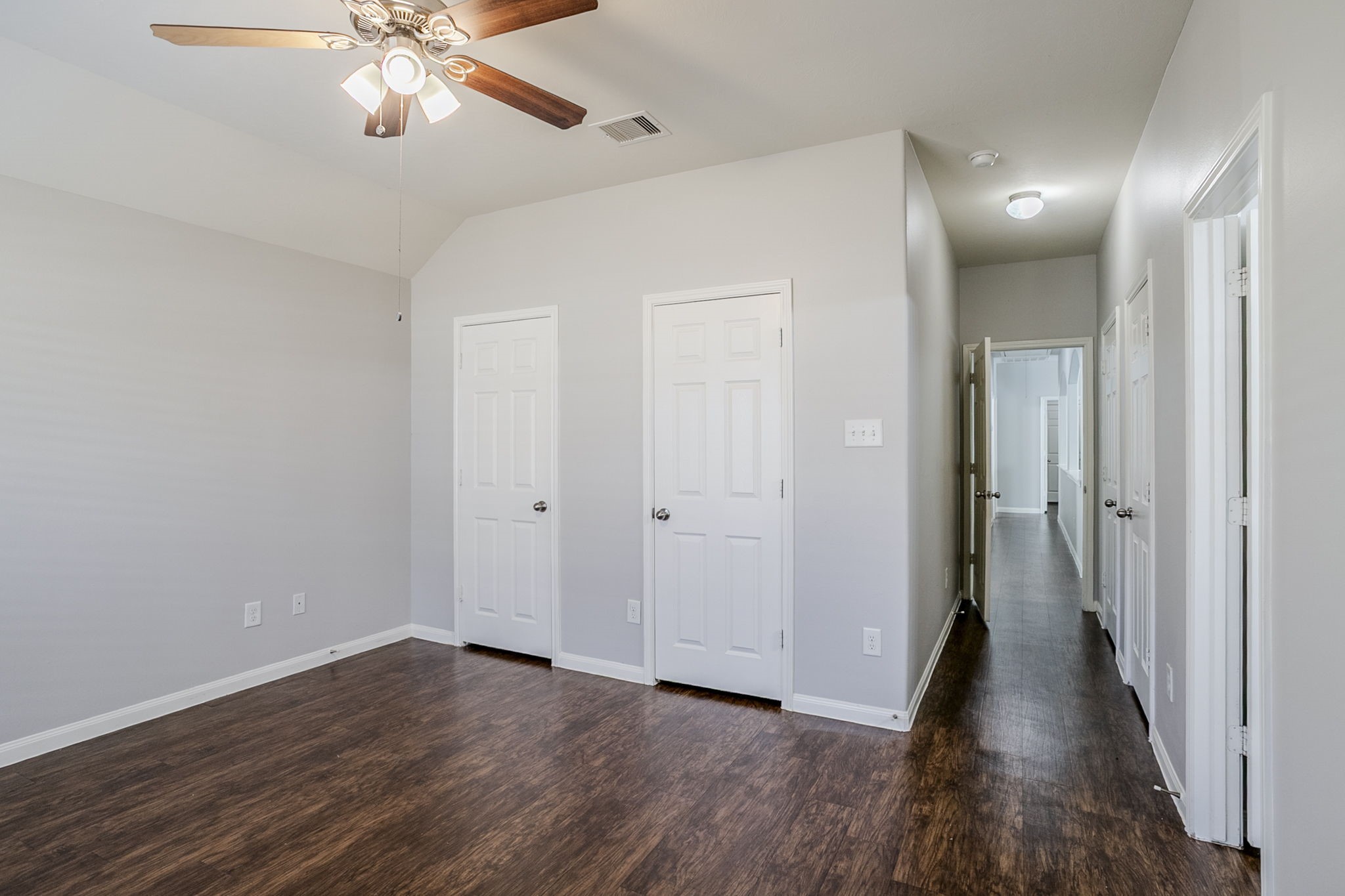 21431 Ryans Path Lane Houston, TX 77073 - Photo 20 of 38 a view of a hallway with wooden floor