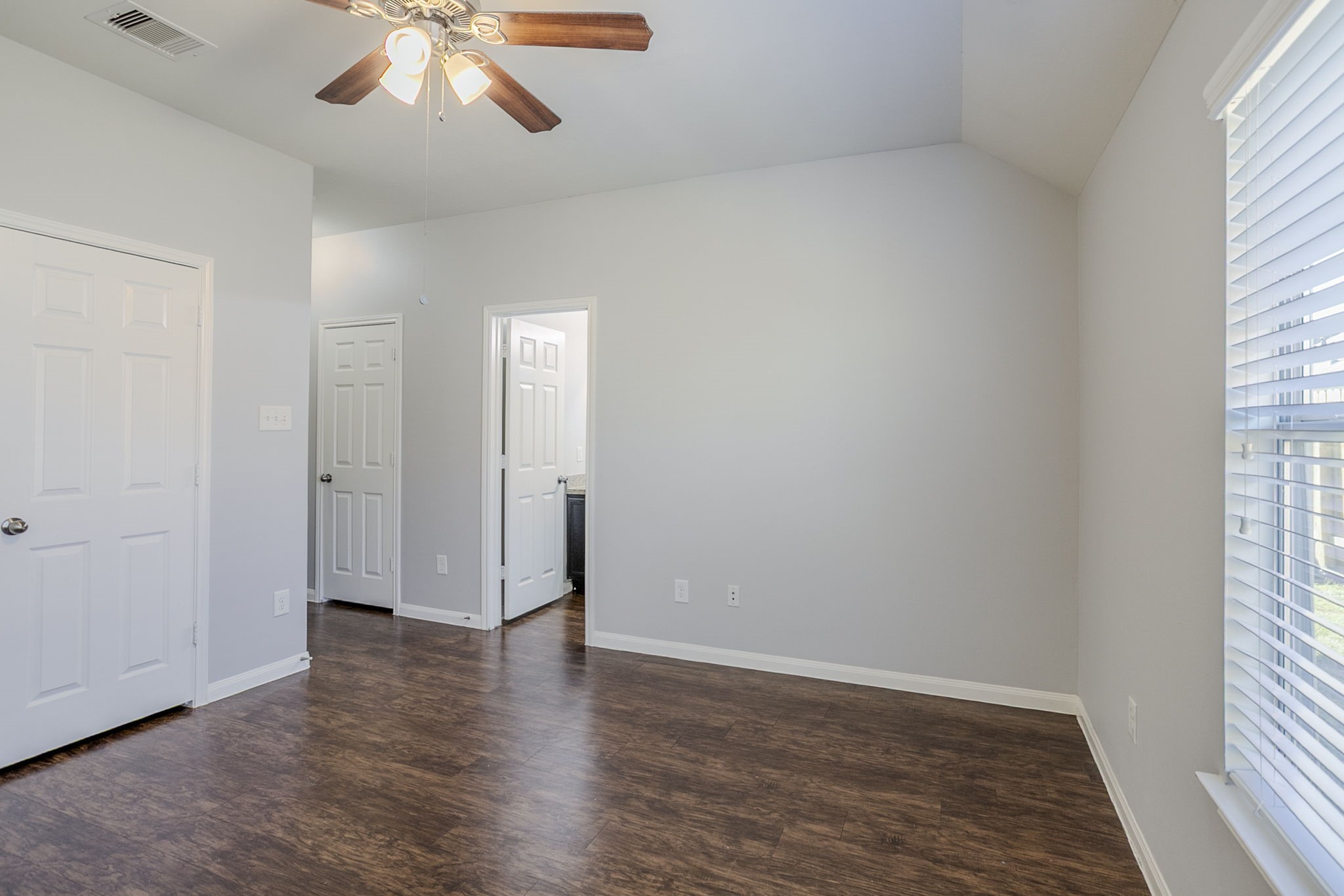 21431 Ryans Path Lane Houston, TX 77073 - Photo 21 of 38 an empty room with wooden floor and windows