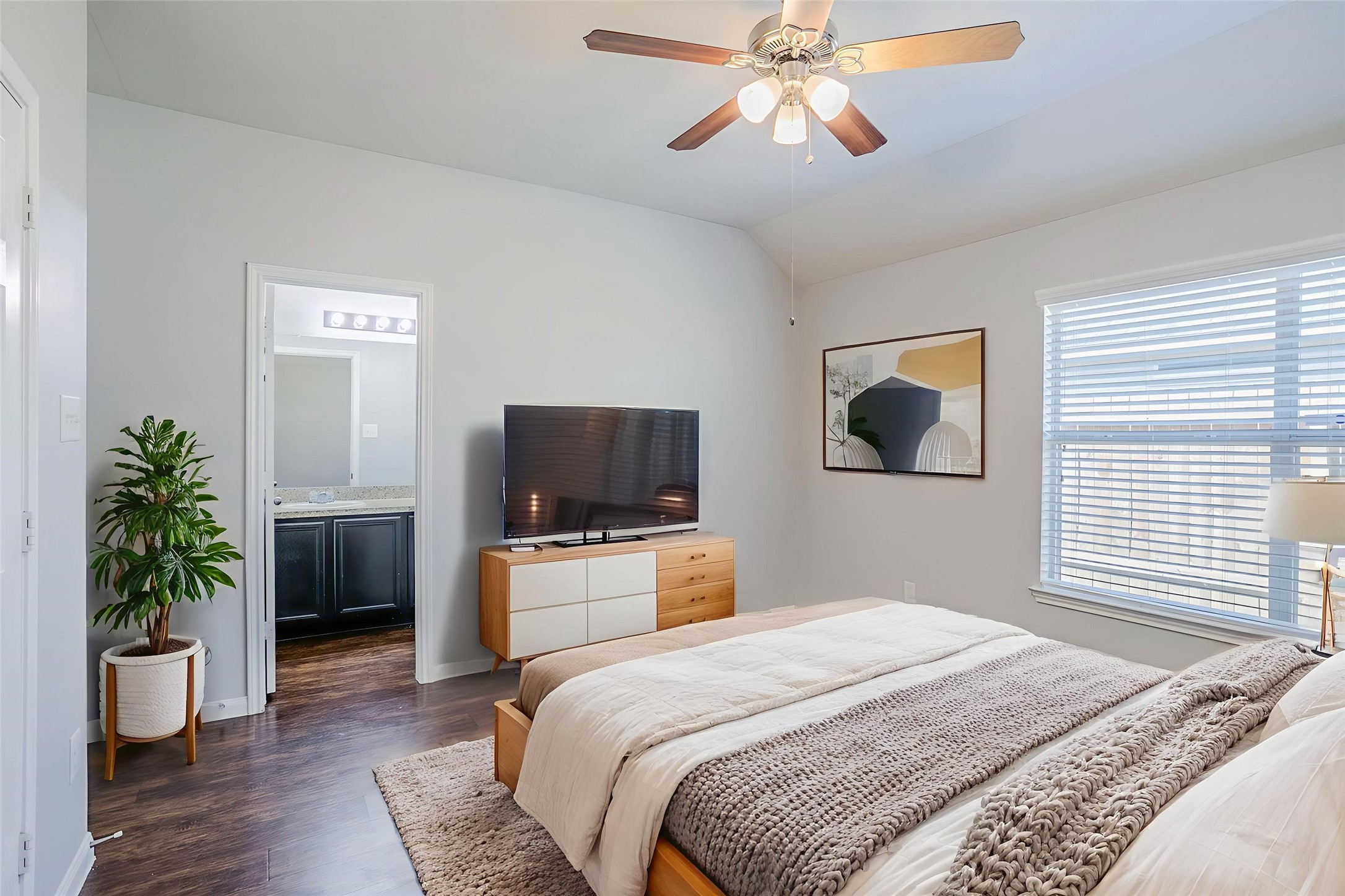 21431 Ryans Path Lane Houston, TX 77073 - Photo 7 of 38 a bedroom with a bed and a television