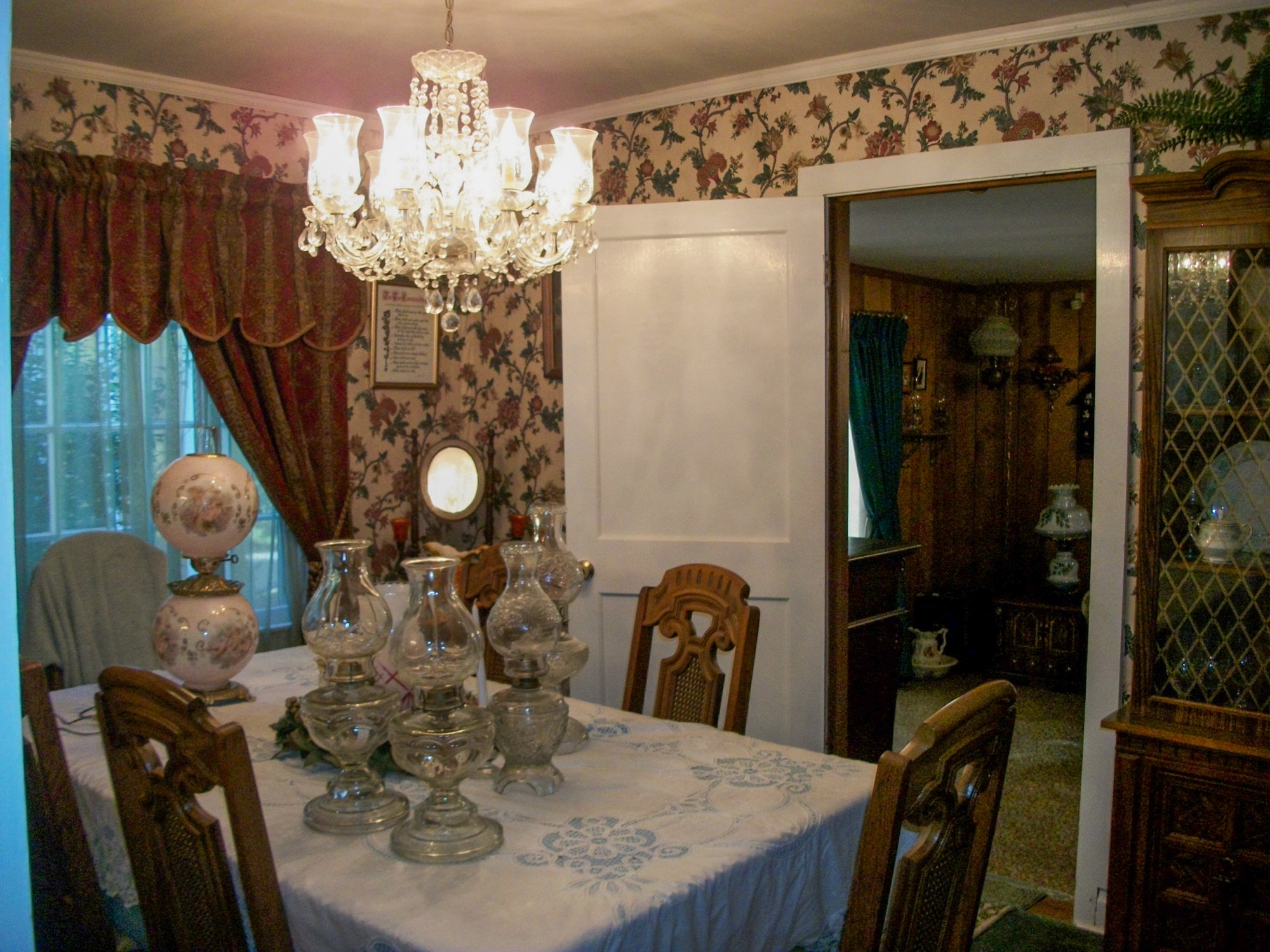 9670 Panther Creek Road Christiana, TN 37037 - Photo 12 of 16 a view of a dining room with furniture and chandelier
