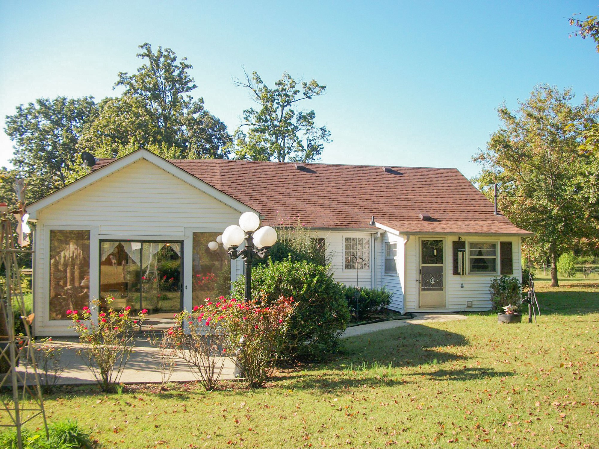 9670 Panther Creek Road Christiana, TN 37037 - Photo 14 of 16 a front view of a house with garden