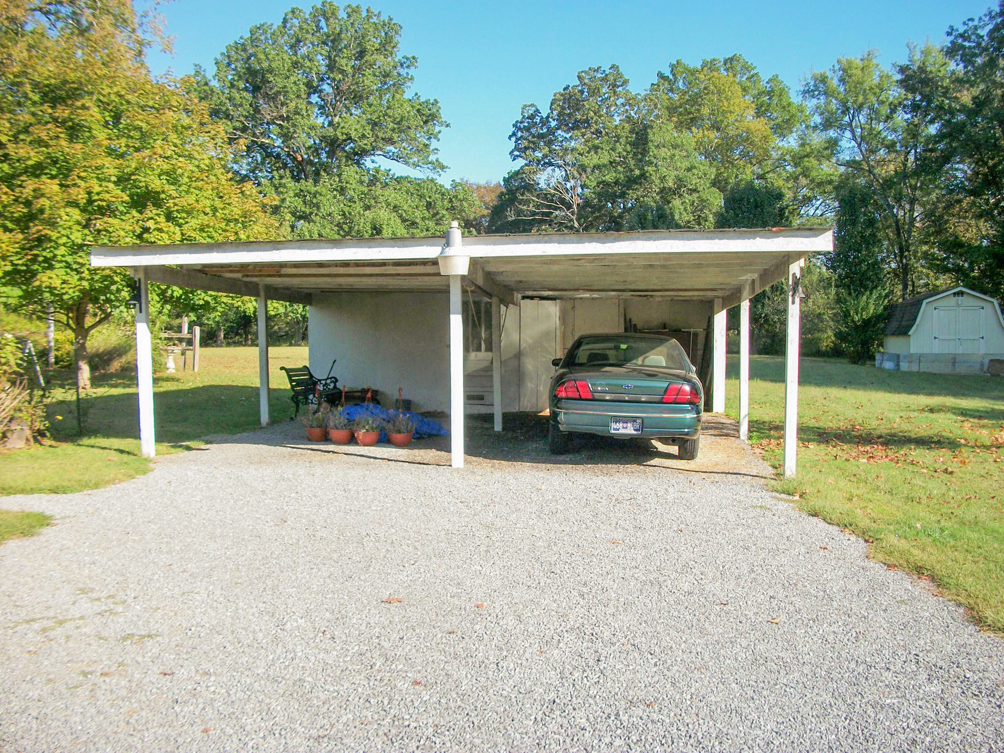 9670 Panther Creek Road Christiana, TN 37037 - Photo 2 of 16 a view of car parked in front of a house