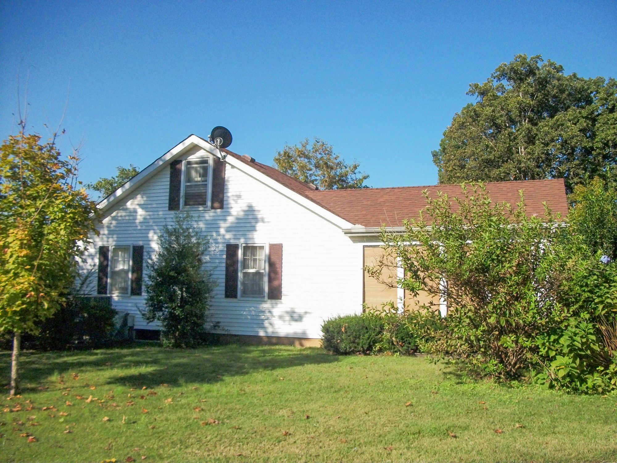 9670 Panther Creek Road Christiana, TN 37037 - Photo 3 of 16 a front view of a house with a yard