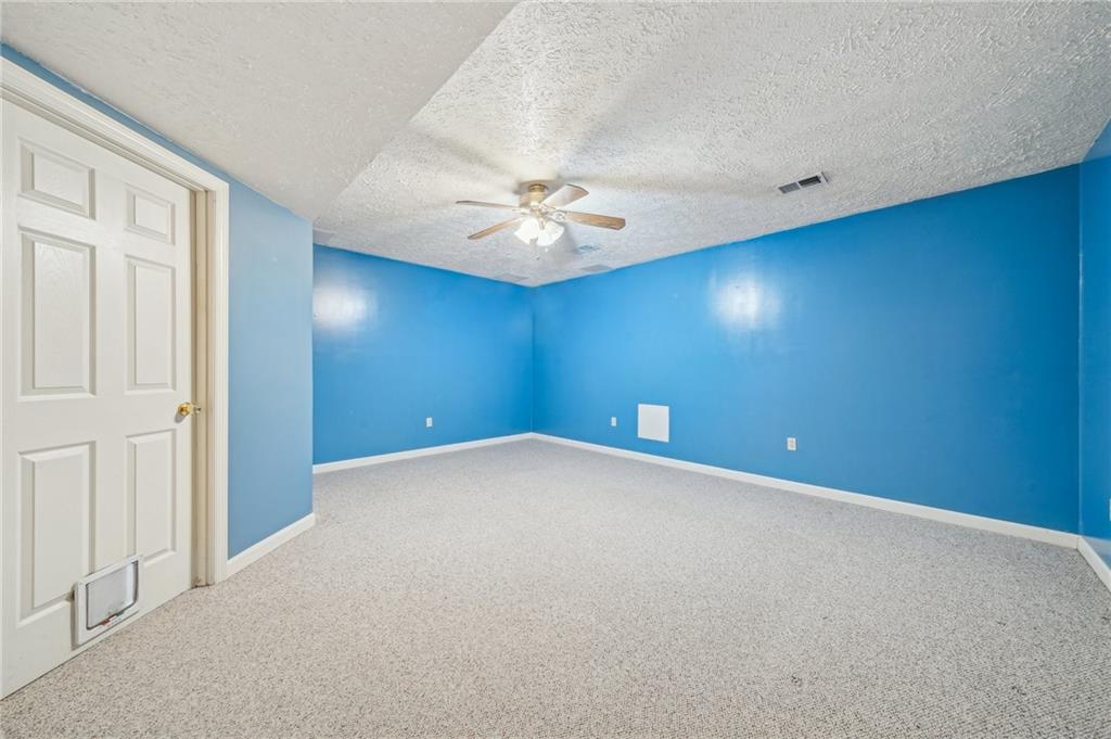 19 Longview Drive Avella, PA 15312 - Photo 19 of 26 Lower Level Game Room with ceiling fan