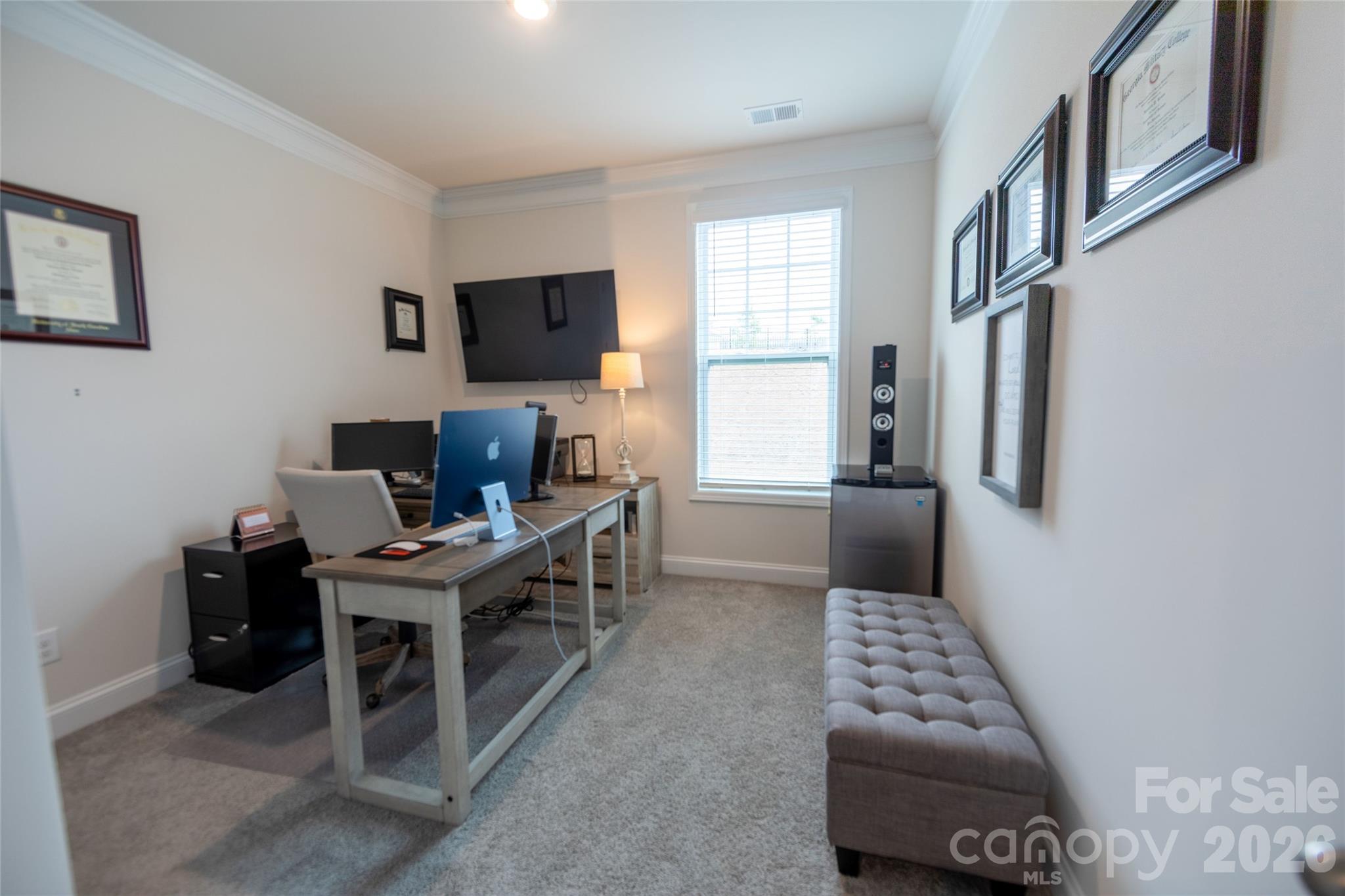 151 Aviendha Lane Troutman, NC 28166 - Photo 17 of 43 a view of a workspace with a window