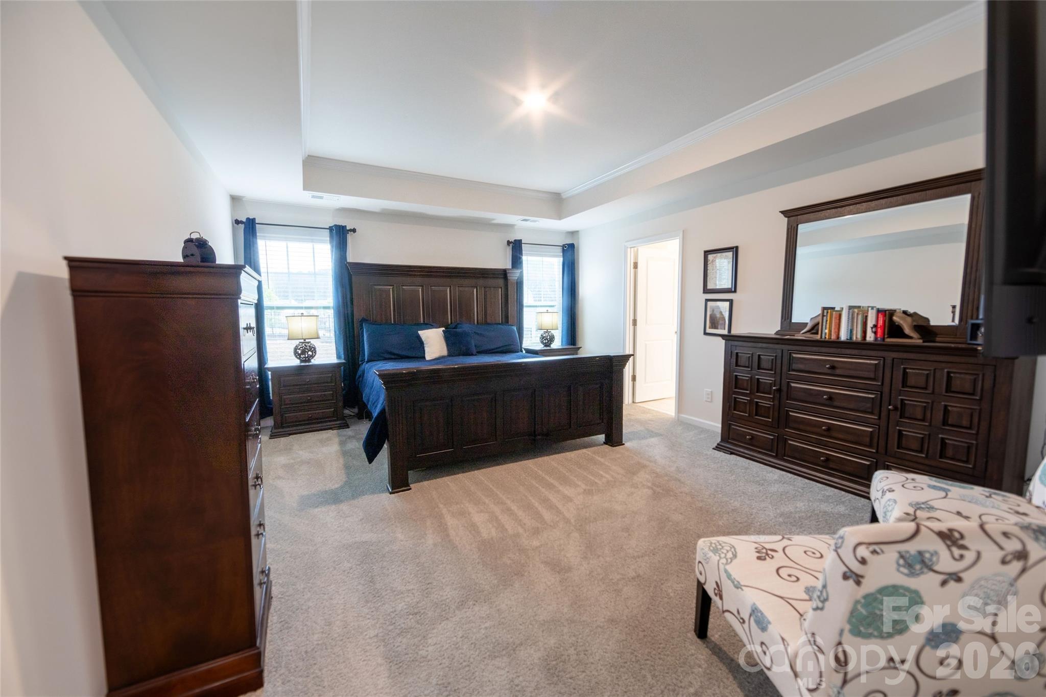 151 Aviendha Lane Troutman, NC 28166 - Photo 22 of 43 a bedroom with furniture and window