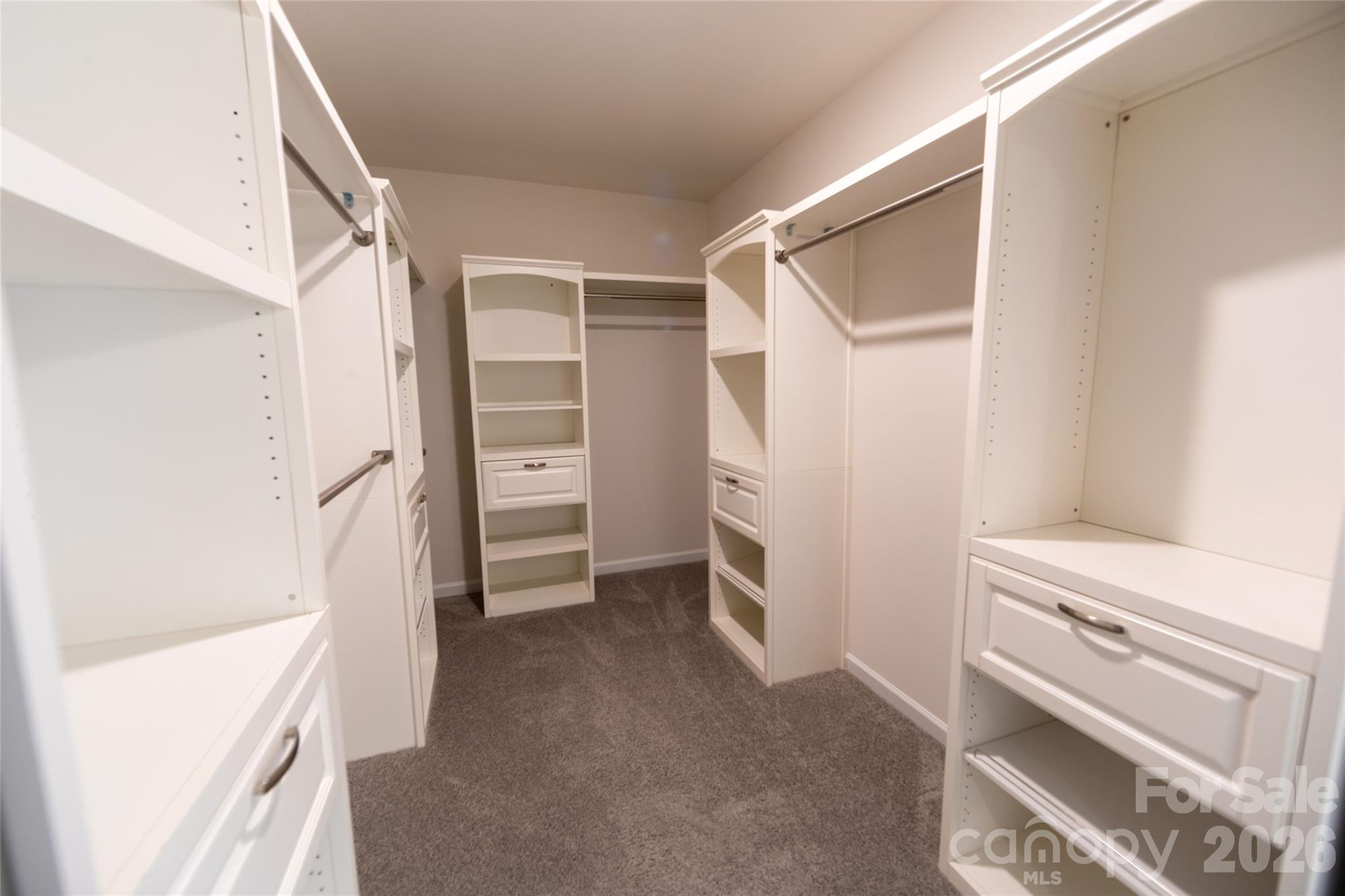 151 Aviendha Lane Troutman, NC 28166 - Photo 27 of 43 a view of an empty walk in closet