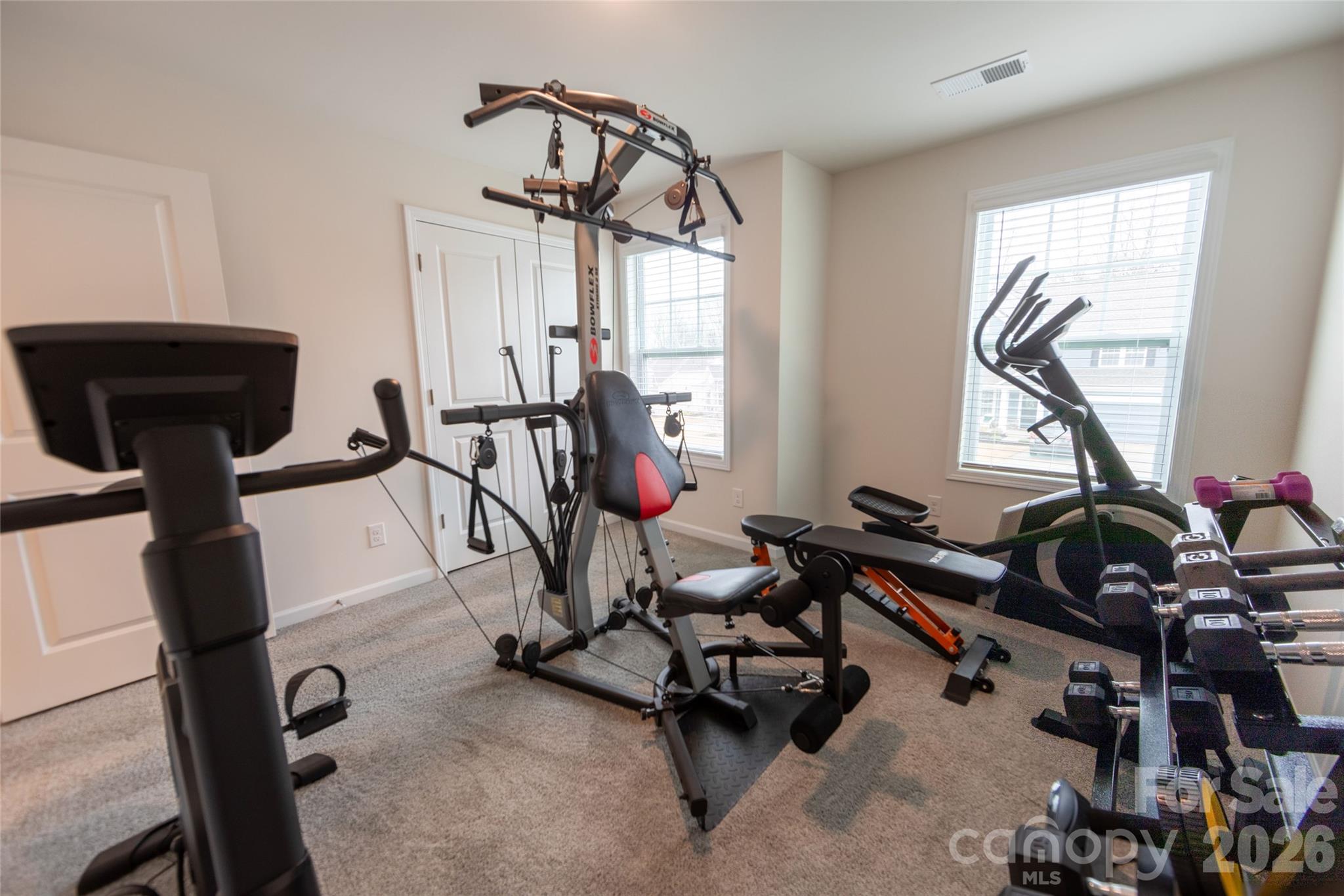 151 Aviendha Lane Troutman, NC 28166 - Photo 32 of 43 a view of a room with gym equipment