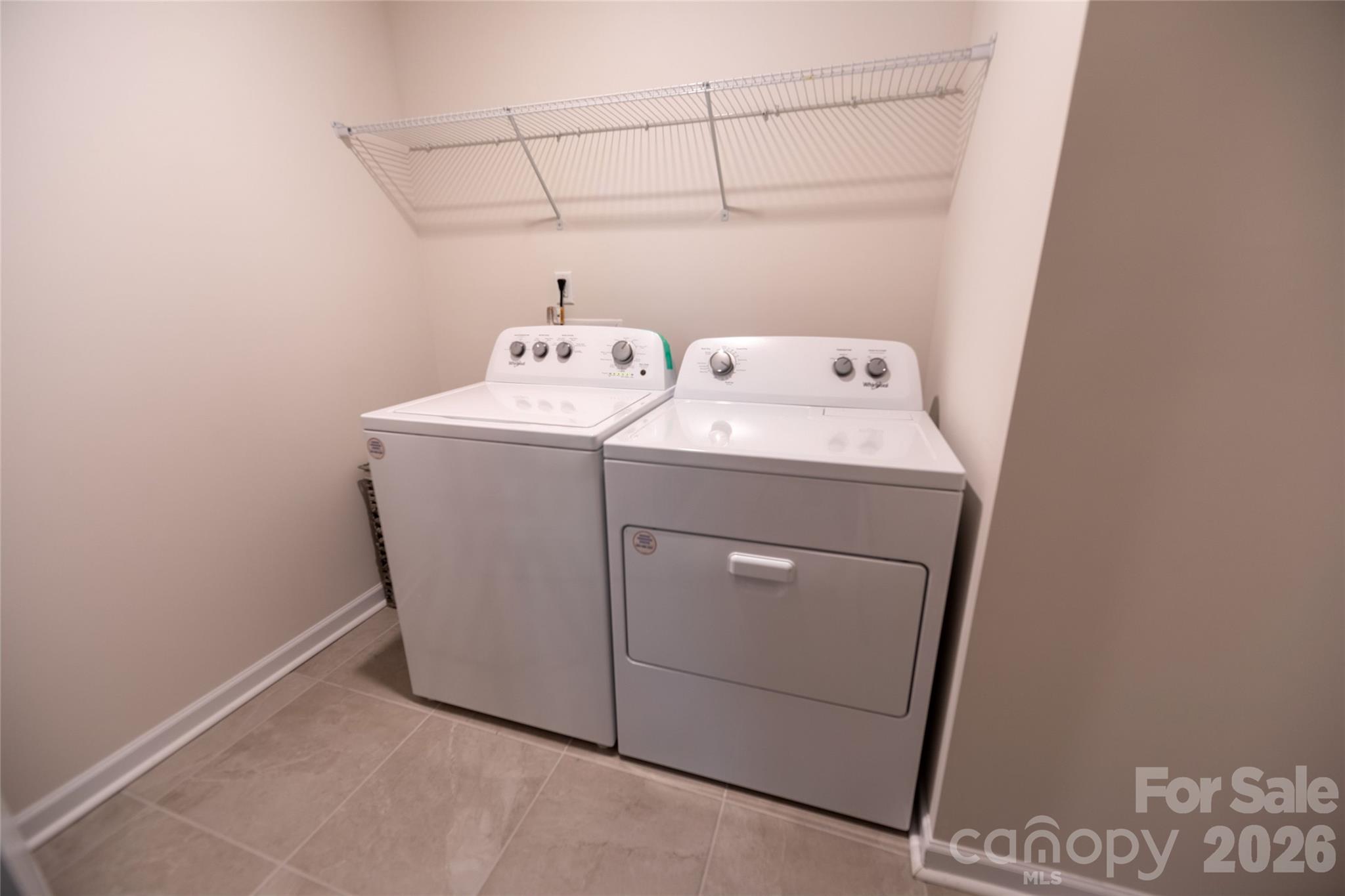 151 Aviendha Lane Troutman, NC 28166 - Photo 36 of 43 a utility room with dryer and washer