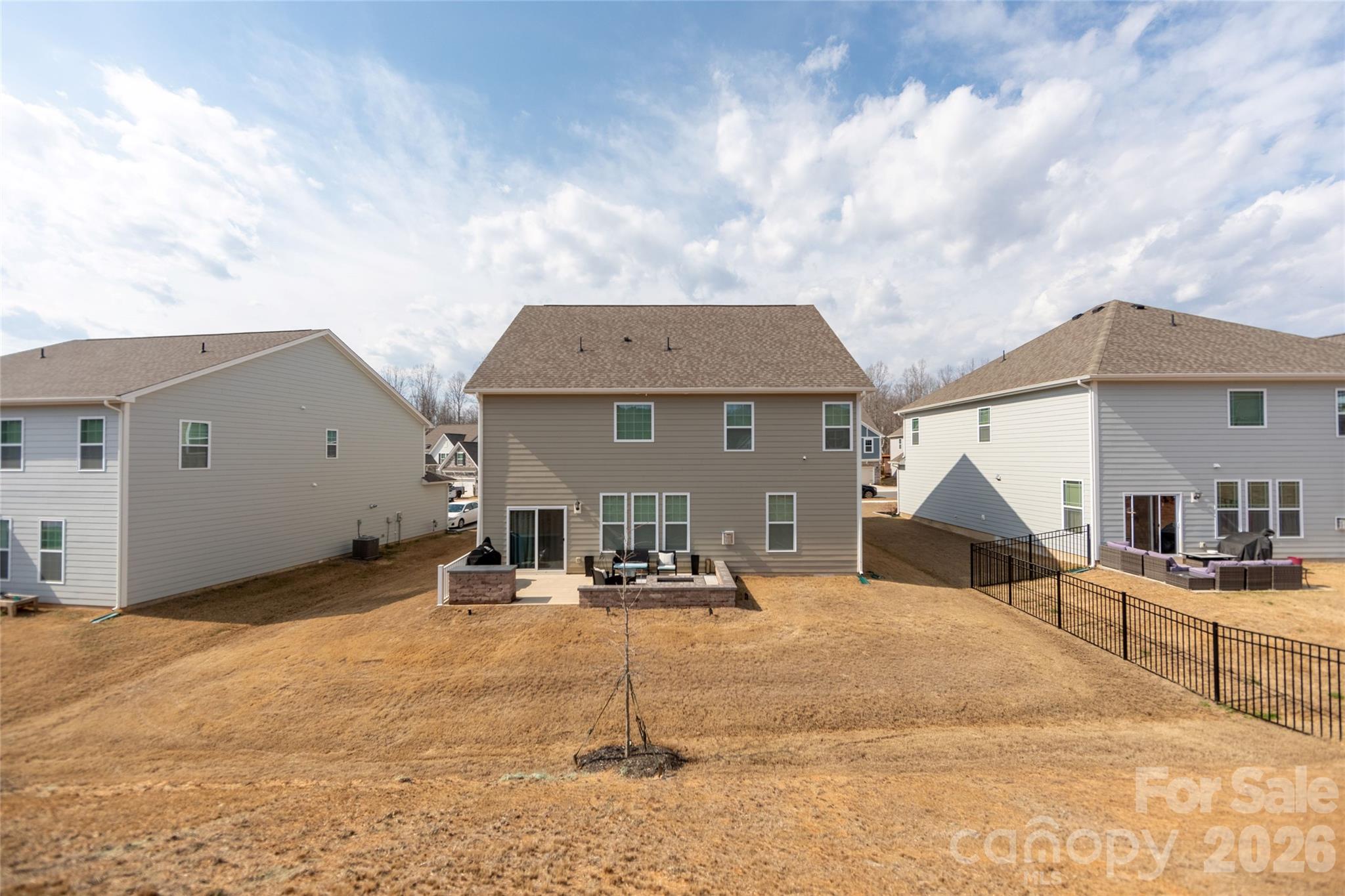 151 Aviendha Lane Troutman, NC 28166 - Photo 40 of 43 a view of a house with sitting area and roof
