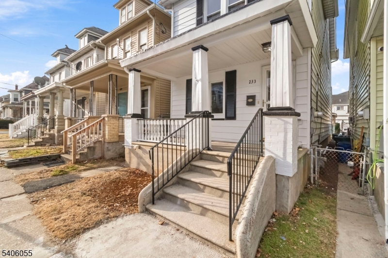 233 Irwin Street Phillipsburg, NJ 08865 - Photo 27 of 33 a view of a house with wooden floor and a fence