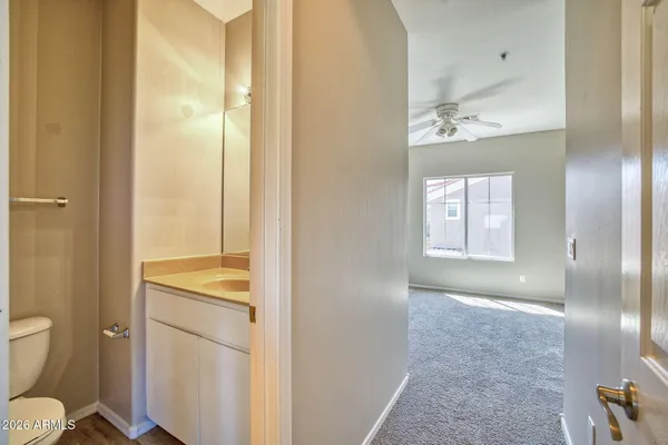a view of an empty room with a window