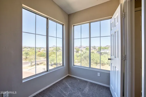 an empty room with a bathroom