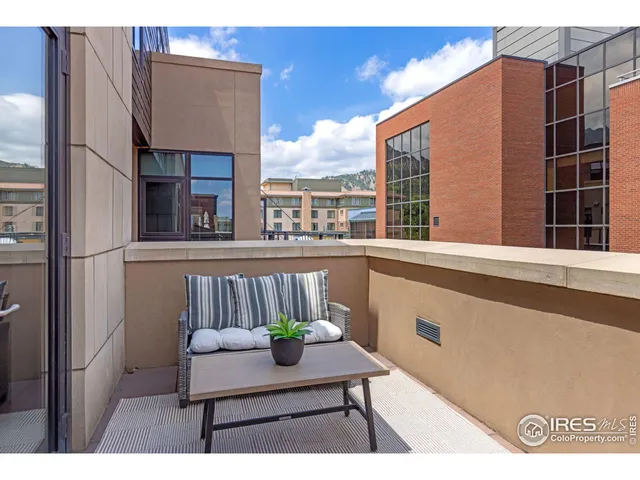a view of kitchen with furniture and a window