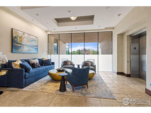 a view of a building with potted plants
