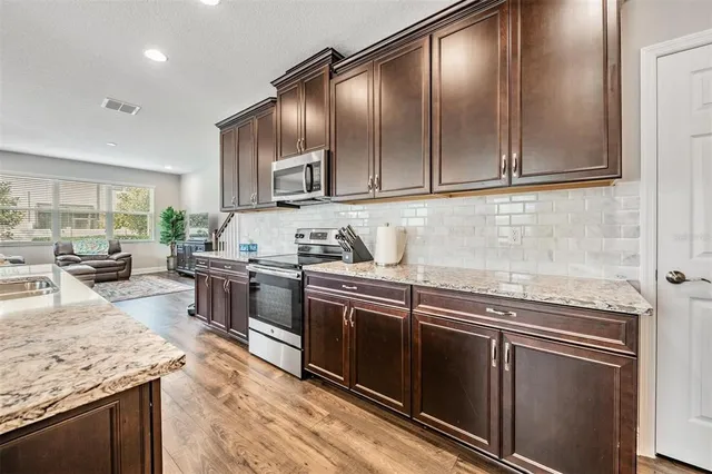 $410,000 | 1919 Lake Waters Place, Lutz, FL 33558