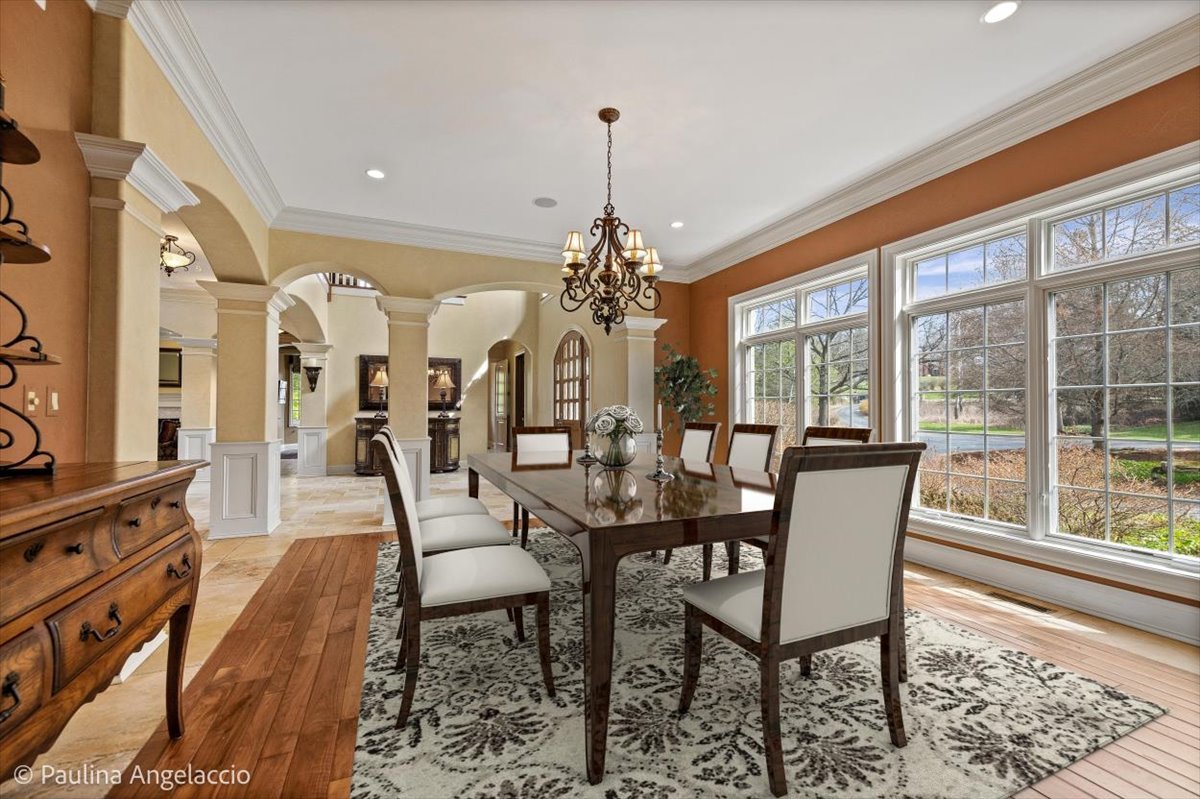 419 North Valley Hill Road Bull Valley, IL 60098 - Photo 13 of 95 a view of a dining room with furniture window and wooden floor