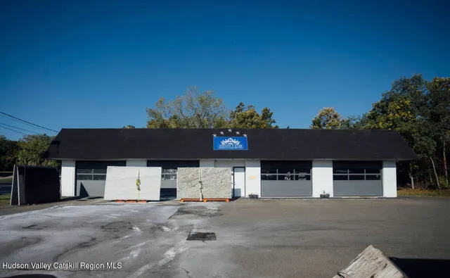 front view of a house with a road