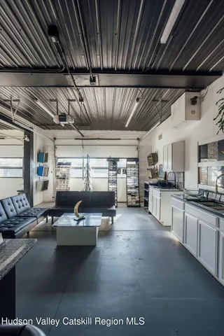 a kitchen with counter top space cabinets and stainless steel appliances
