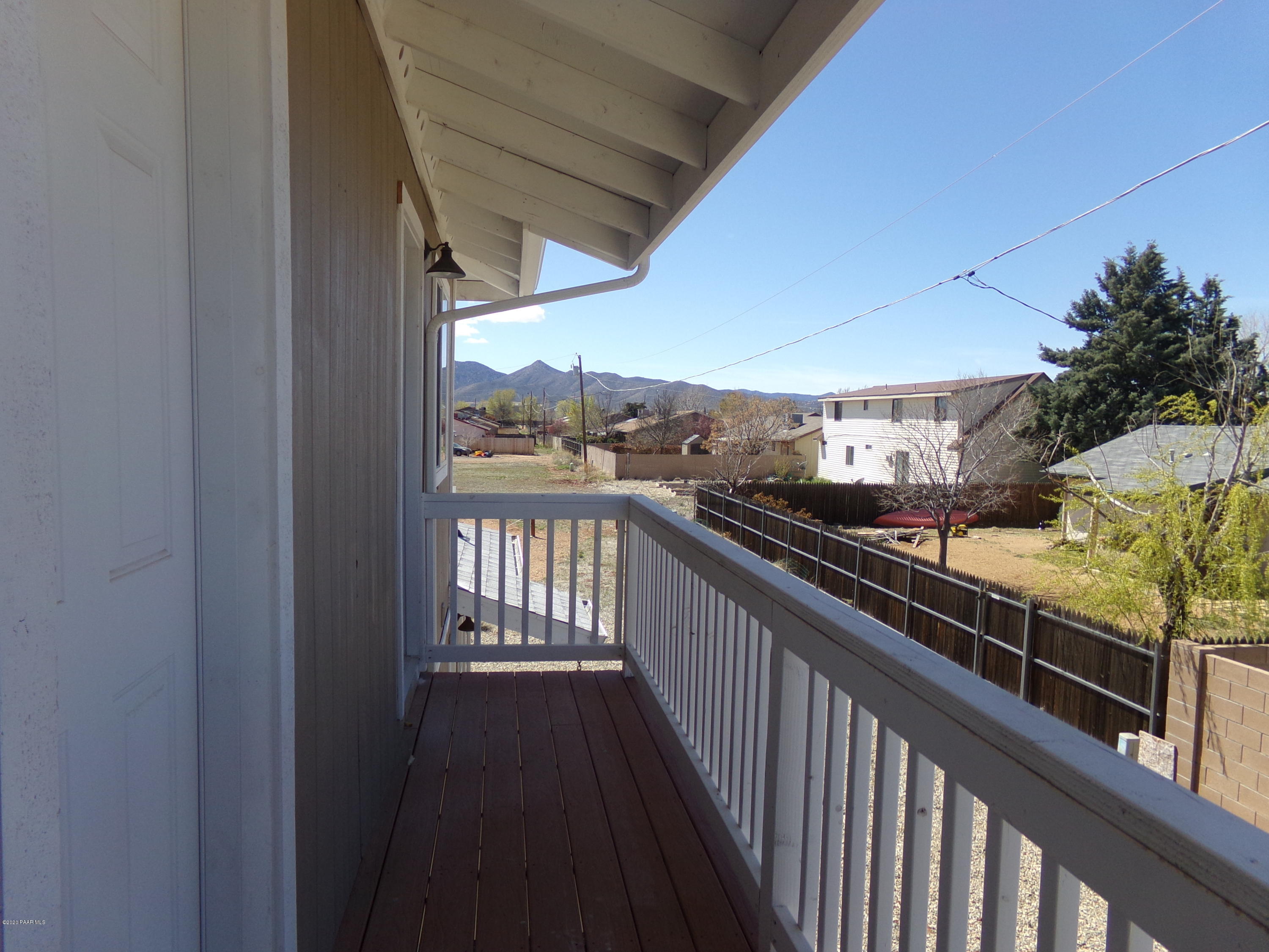 3100 Bob Court, Unit 2 Prescott Valley, AZ 86314 - Photo 7 of 10 a view of a balcony with wooden floor