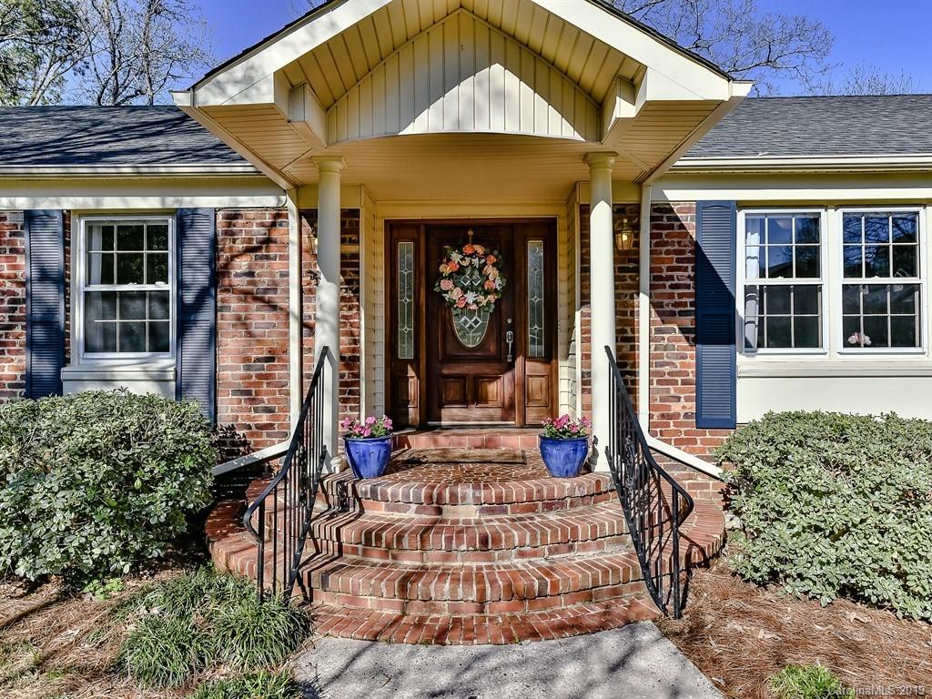 5300 Guildbrook Road Charlotte, NC 28226 - Photo 2 of 35 a front view of a house with garden